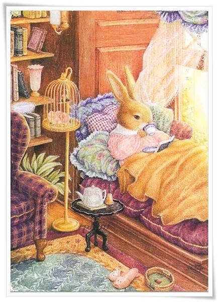 bunny reading on bed.jpg