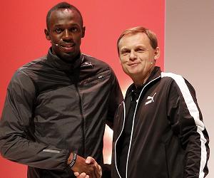 Usain Bolt with PUMA CEO Bjoern Gulden (2)