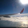 plane above clouds