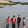 A group idling at the seaside