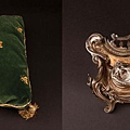 Intricate heavy silverplate inkwell, linen and lace tablecloth, and green pillow from Desirée sold for 1,600.00USD