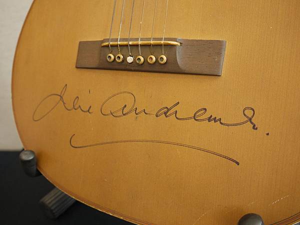 Julie Andrews “Maria” acoustic guitar, autographed by Andrews, from The Sound of Music sold for 140,000 USD