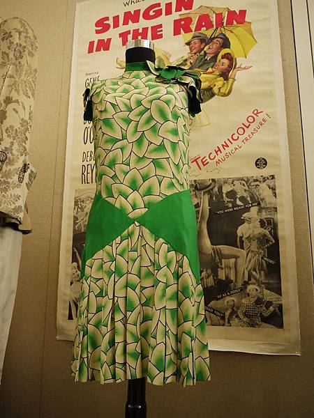 Debbie Reynolds green & white leaf patterned sleeveless dress from Singin’ in the Rain sold for 15,000.00USD