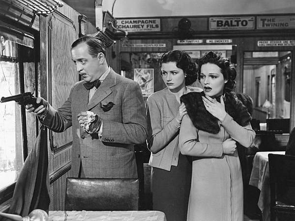 lady-vanishes-the-1938-005-linden-travers-margaret-lockwood-basil-radford-pistol-train-bfi-00m-zku.jpg