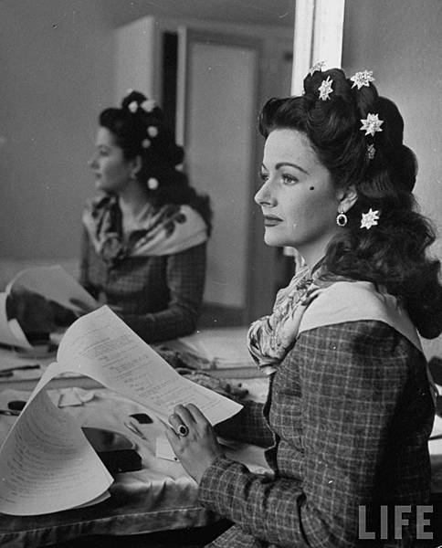 Margaret Lockwood reading in her dressing room on the set of Hungry Hill (1947).jpg