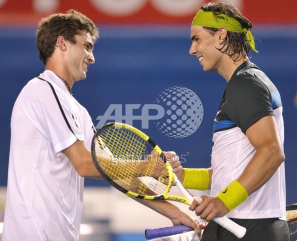 Gilles Simon and Rafael Nadal at the Australian Open.jpg