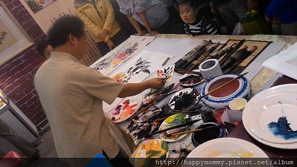 2015.03.08 花博公園看花燈 北京廟會做捏麵人 吹糖 (22).jpg