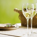 JW028_350A_two_glaeese_of_white_wine_on_table.jpg