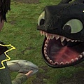 toothless night fury dragon eating small.jpg