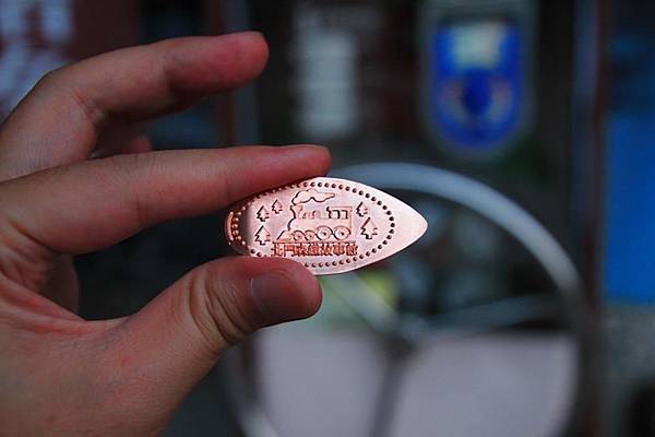 來自己"轉"個紀念幣