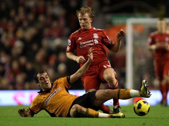 kuyt tackled.jpg