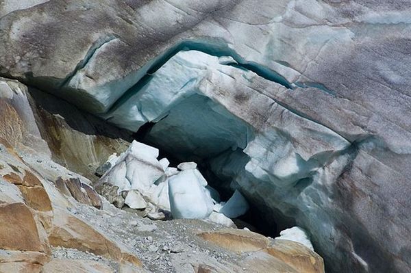 Rhonegletscher@Small natural ice cave and ice collapse on the glacier's western margin (August 2007)
