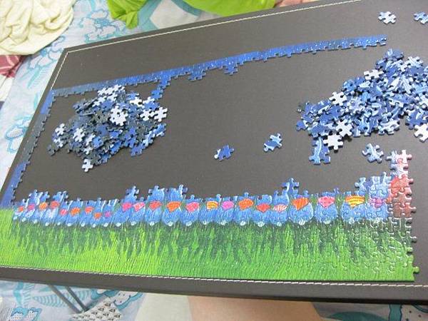 2011.10.03 1000 pcs 兔兔排排坐_品質很差的雷諾瓦 (12).jpg