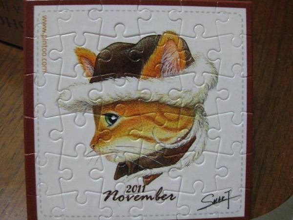 2011.11.04 36 pcs 11月份心鼻貓杯墊 (2).jpg