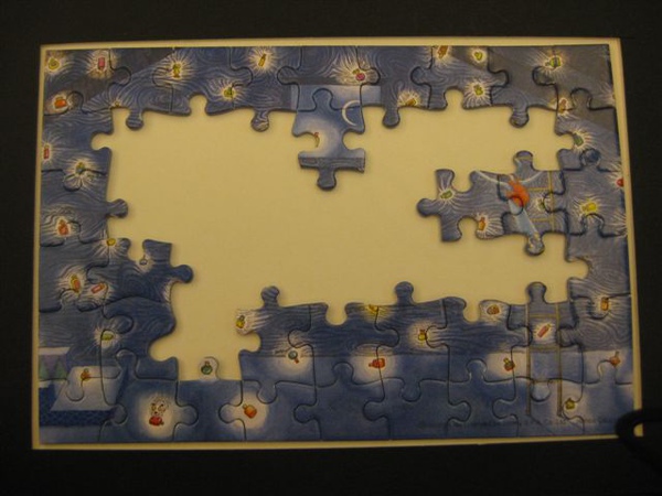 2010.01.24 拼圖咖啡因_幾米54片奇幻瓶子 (2).JPG