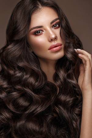 beautiful-brunette-model-curls-classic-makeup-full-lips-beauty-face.jpg