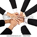 stock-photo-the-concept-of-teamwork-and-cooperation-teammate-s-hands-on-top-of-each-other-64637653.jpg