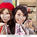 stock-photo-two-happy-girls-in-a-shopping-center-65230675.jpg