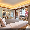 amnaya-kuta-deluxe-room-double-bed-with-view-to-bathroom-1530857456.jpg