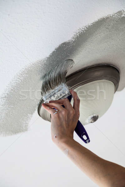 4843096_stock-photo-painting-the-edges-of-the-ceiling.jpg