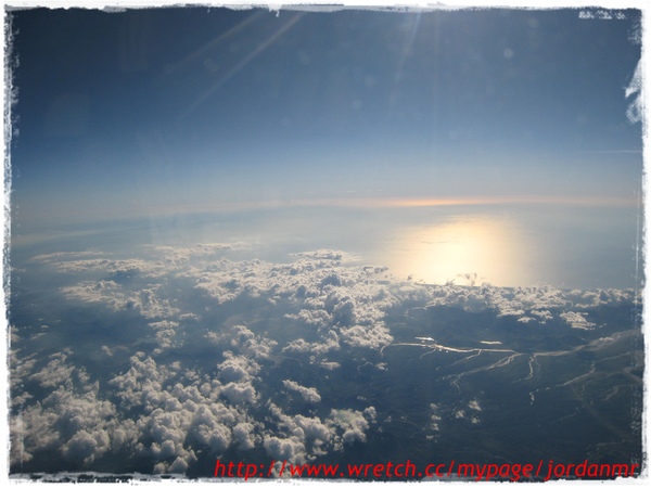 飛機上拍的雲彩與陸地2.jpg