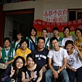 1386842049-和高雄社會局與張老師志工合影.jpg