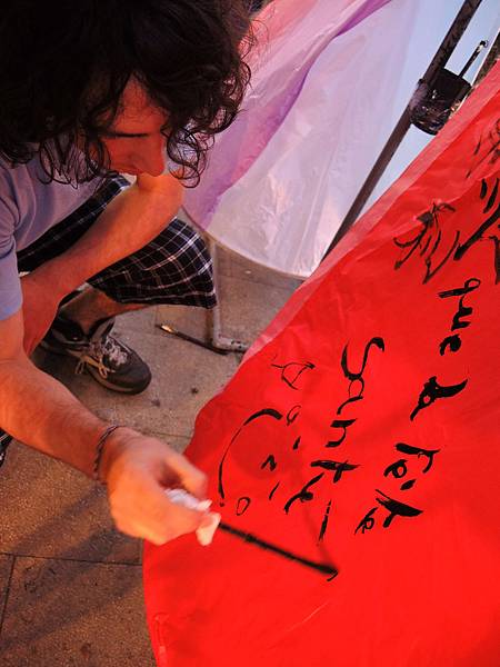 Renaud Pigu who is writing his wishes on the sky lantern.