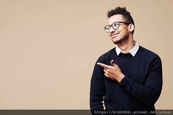 portrait-handsome-young-smiling-afro-man-wearing-glasses-smiling-standing-with-open-hand-gesture-isolated-beige-wall.jpg