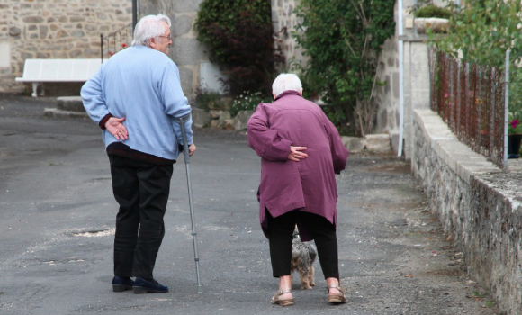 Image-of-an-elderly-couple-supporting-their-backs-and-walking-with-canes.-.png Image-of-an-elderly-couple-supporting-their-backs-and-walking-with-canes.-.png