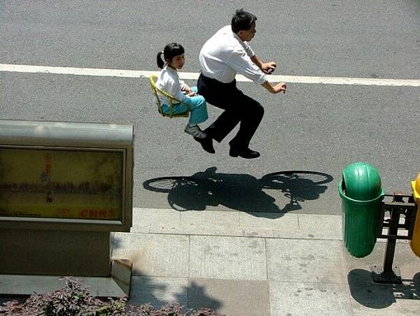 Floating-Invisible-Bicycle-Photos-by-Zhao-Huasen-01-630x474