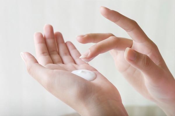 woman-applying-hand-lotion.jpg