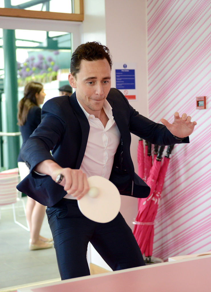 Tom Hiddleston attends the Evian Suite of the Wimbledon Lawn Tennis Championships 