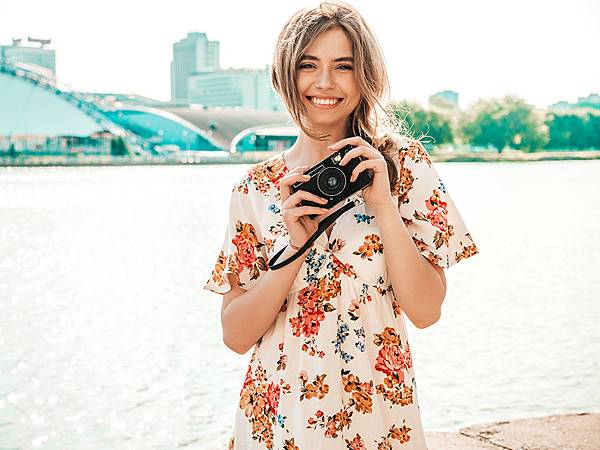 smiling-hipster-girl-trendy-summer-sundress-holding-retro-camera-PX1000.jpg