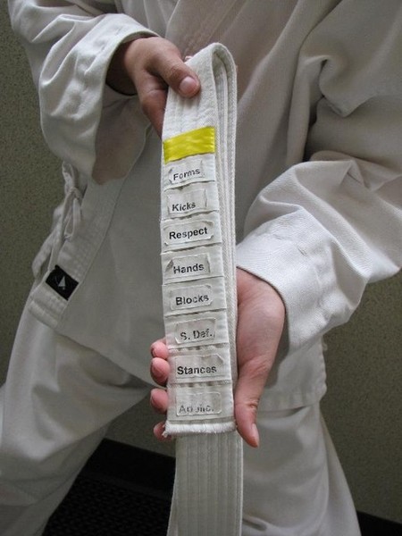 white belt with all the tags