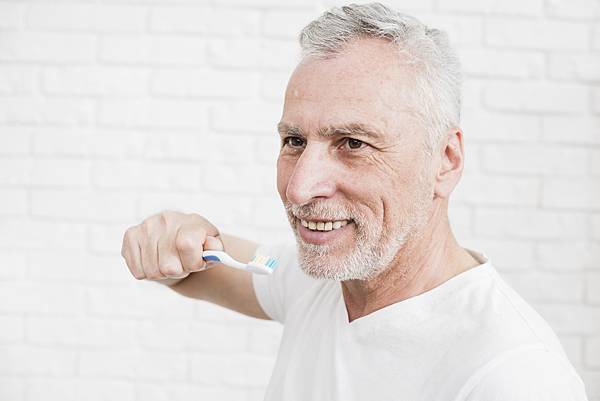 elder-man-washing-his-teeth