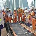 examing expansion joint on steel bridge