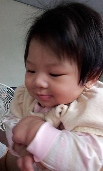 嘴巴故意裝歪歪的