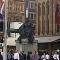 The statue in front of QVB.