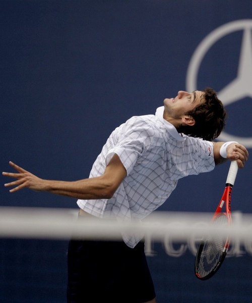 2009北京-1010-cilic-戰勝nadal-好腰力.jpg