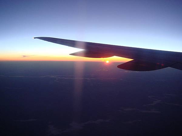 Sunrise beneath the wing