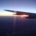 Sunrise beneath the wing