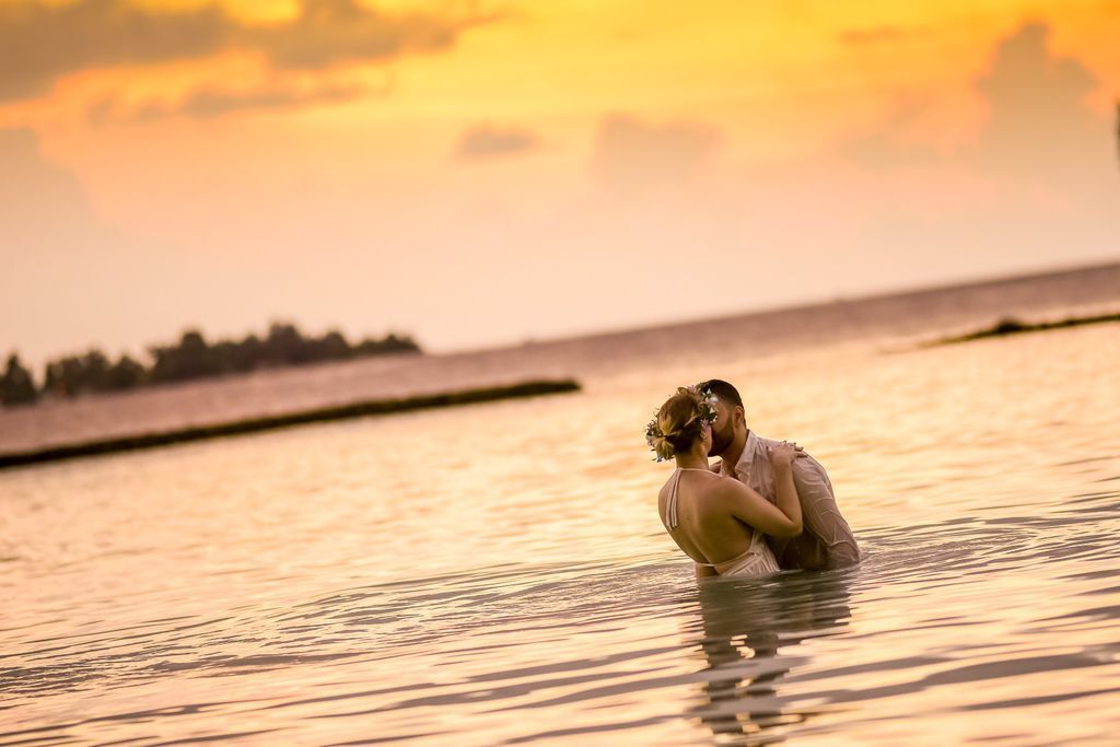 woman-and-man-kissing-in-body-of-water-1024991.jpg