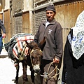 Man with His Donkey