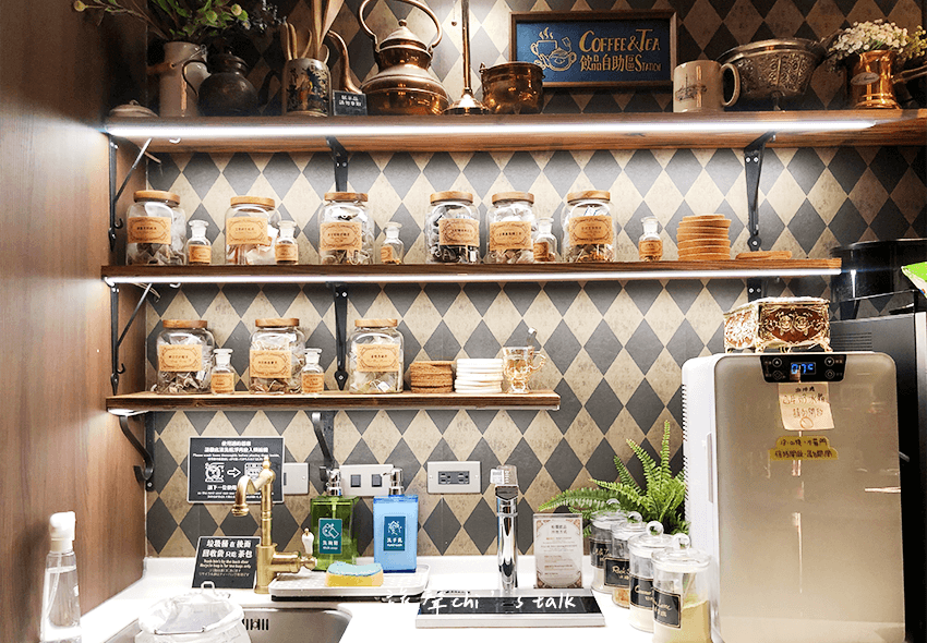 An aerial view of waves crashing against a shore.