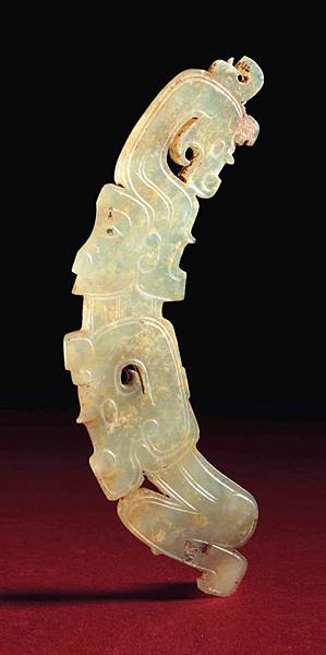 2016_NYR_12171_0911_000(a_very_rare_and_superb_pale_greenish-yellow_jade_figural_pendant_weste)