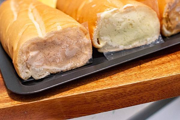 【新莊美食】里洋烘焙-每月熱賣數千條！外層酥脆裡面柔軟細緻的塔帕斯爆餡麵包，也可冷凍宅配