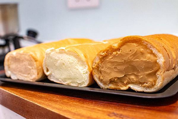 【新莊美食】里洋烘焙-每月熱賣數千條！外層酥脆裡面柔軟細緻的塔帕斯爆餡麵包，也可冷凍宅配