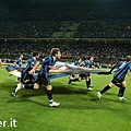 Inter's players parade the 15th Scudetto flag around the pitch.jpg
