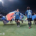 The Nerazzurri celebrate in front of the home fans after wrapping up the title last week at Siena..j