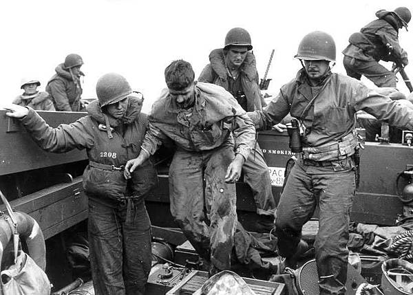 Assisting_Wounded_Iwo_Jima.jpg